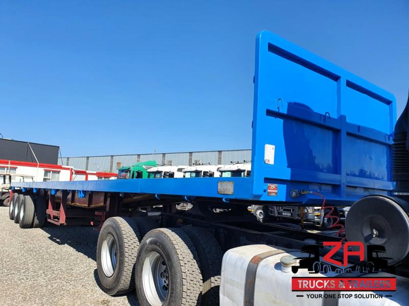 2015 HPC STEEL PRESSING TRI-AXLE FLAT DECK