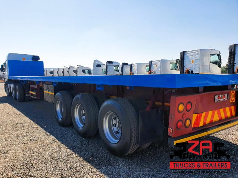 2015 HPC STEEL PRESSING TRI-AXLE FLAT DECK