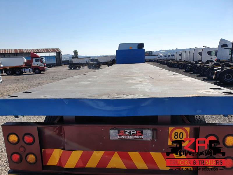 2015 HPC STEEL PRESSING TRI-AXLE FLAT DECK