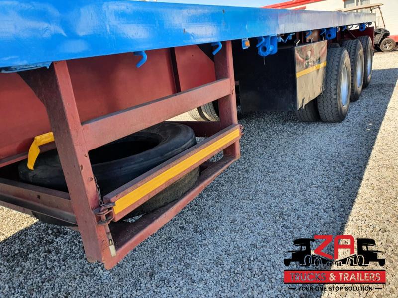 2015 HPC STEEL PRESSING TRI-AXLE FLAT DECK