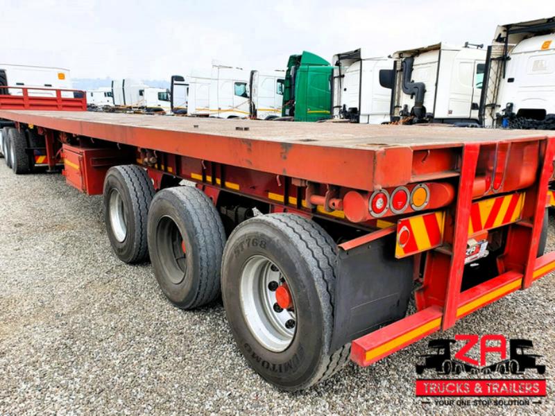 2011 13.5m ROADHOG TRI-AXLE FLAT DECK TRAILER