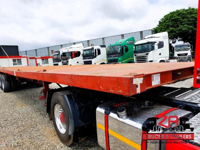 2004 15 meter KEARNEYS TRI-AXLE FLAT DECK TRAILER