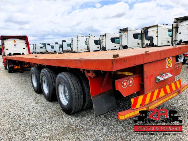 2004 15 meter KEARNEYS TRI-AXLE FLAT DECK TRAILER