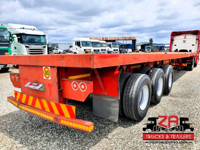 2004 15 meter KEARNEYS TRI-AXLE FLAT DECK TRAILER