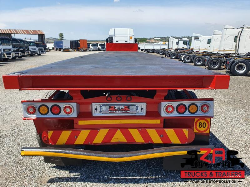 2012 TRAILSTAR TRI-AXLE FLAT DECK TRAILER