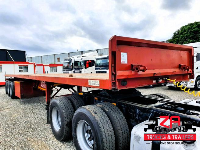 2012 TRAILSTAR TRI-AXLE FLAT DECK TRAILER