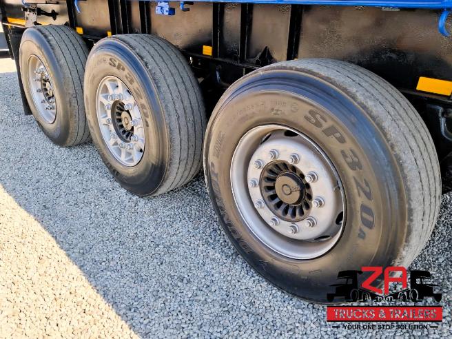 2022 HENRED FREUHAUF TRI-AXLE FLAT DECK TRAILER
