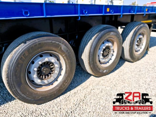 2022 HENRED FREUHAUF TRI-AXLE FLAT DECK TRAILER