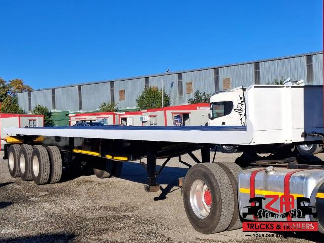 2014 HENRED FRUEHAUF TRI-AXLE FLAT DECK