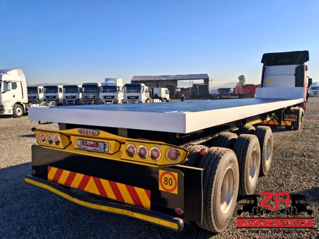 2014 HENRED FRUEHAUF TRI-AXLE FLAT DECK