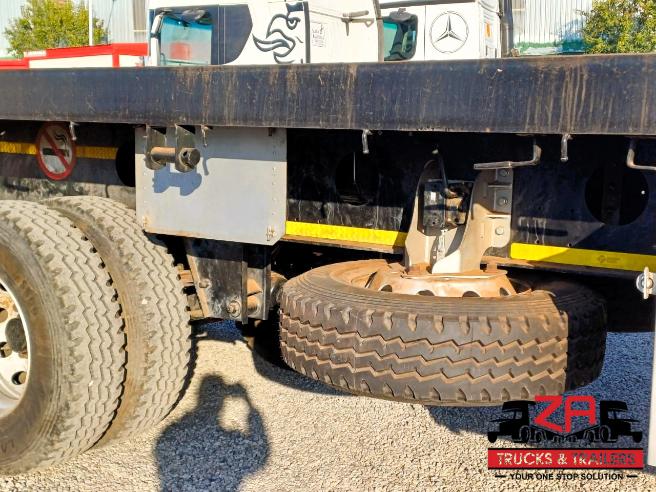 2025 PARAMOUNT TRI-AXLE FLAT DECK TRAILER