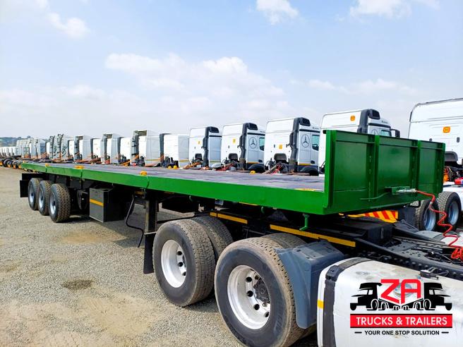 2014 TOP TRAILER TRI-AXLE FLAT DECK TRAILER