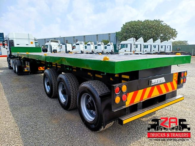 2014 TOP TRAILER TRI-AXLE FLAT DECK TRAILER