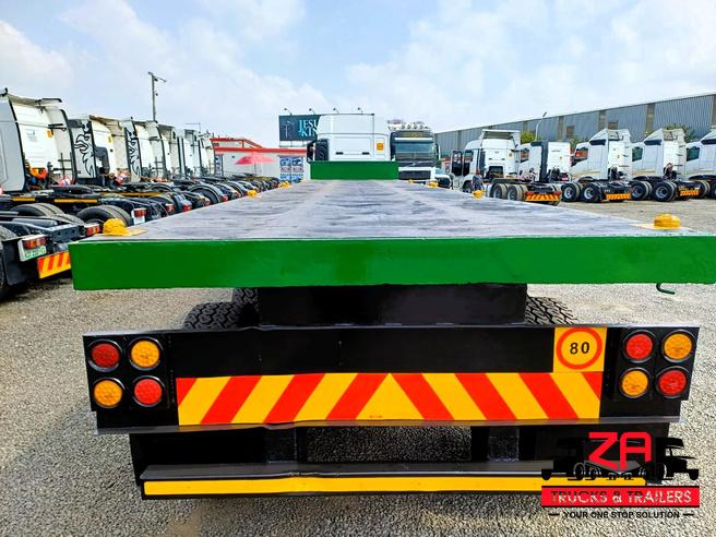 2014 TOP TRAILER TRI-AXLE FLAT DECK TRAILER