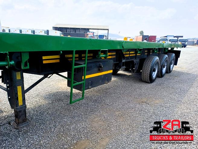 2014 TOP TRAILER TRI-AXLE FLAT DECK TRAILER