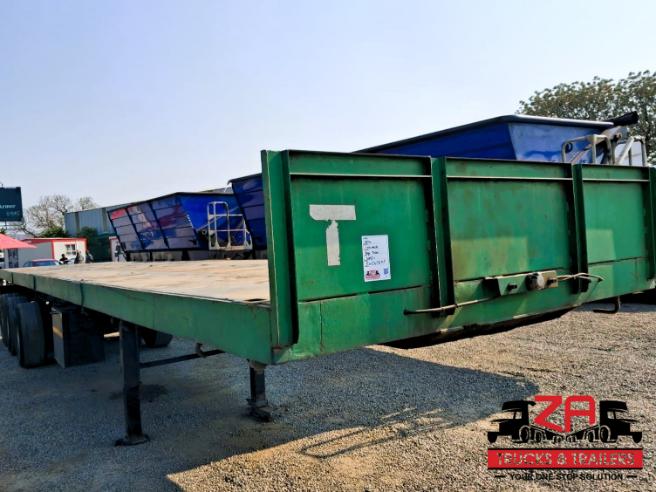 2014 TOP TRAILER TRI-AXLE FLAT DECK TRAILER