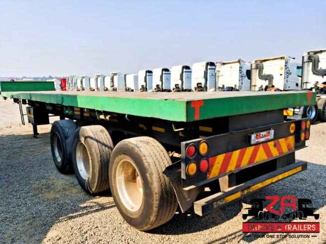 2014 TOP TRAILER TRI-AXLE FLAT DECK TRAILER