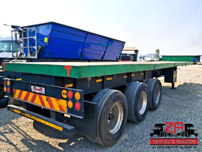 2014 TOP TRAILER TRI-AXLE FLAT DECK TRAILER