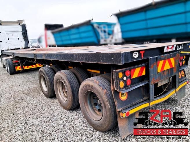 2006 HENRED FREUHAUF TRI-AXLE FLAT DECK