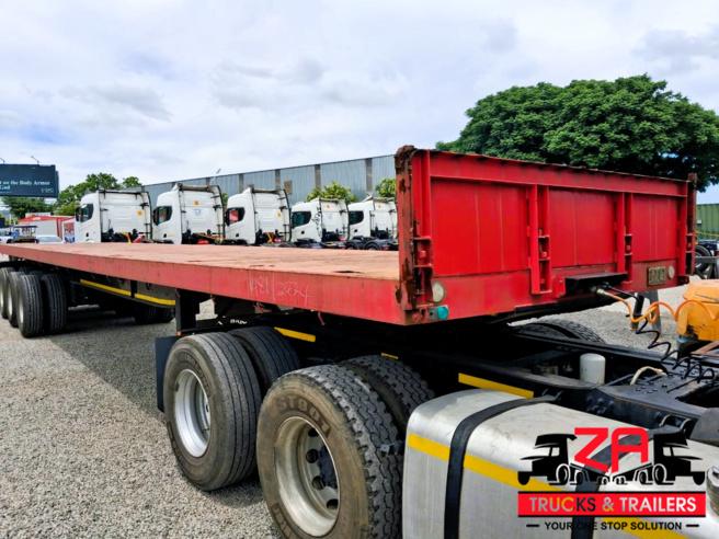 2022 13.2M PARAMOUNT TRI AXLE FLAT DECK TRAILER