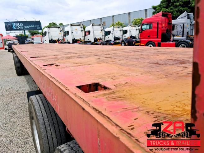 2022 13.2M PARAMOUNT TRI AXLE FLAT DECK TRAILER