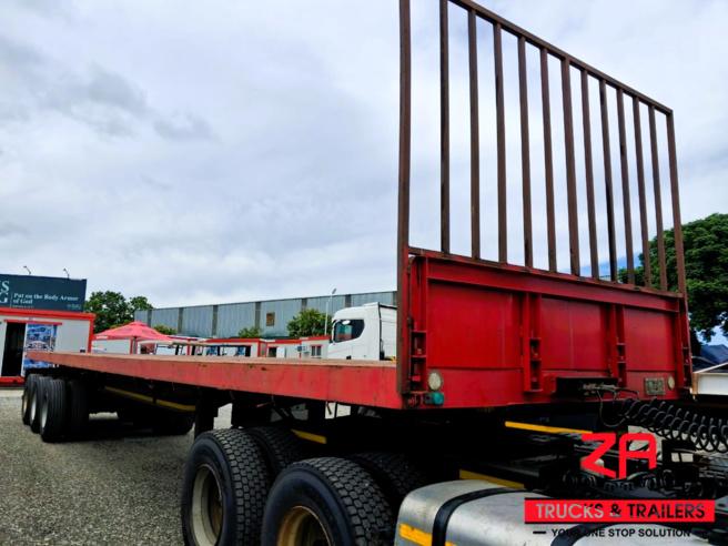 2022 PARAMOUNT TRI AXLE FLAT DECK TRAILER