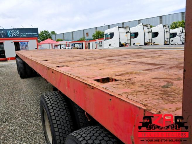 2022 PARAMOUNT TRI AXLE FLAT DECK TRAILER