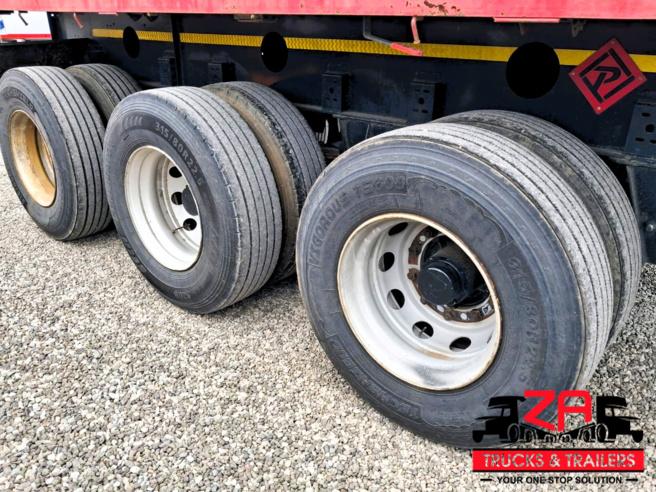 2022 PARAMOUNT TRI AXLE FLAT DECK TRAILER