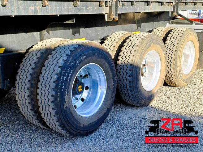 2023 HENRED FRUEHAUF TRI-AXLE DROPSIDE TRAILER