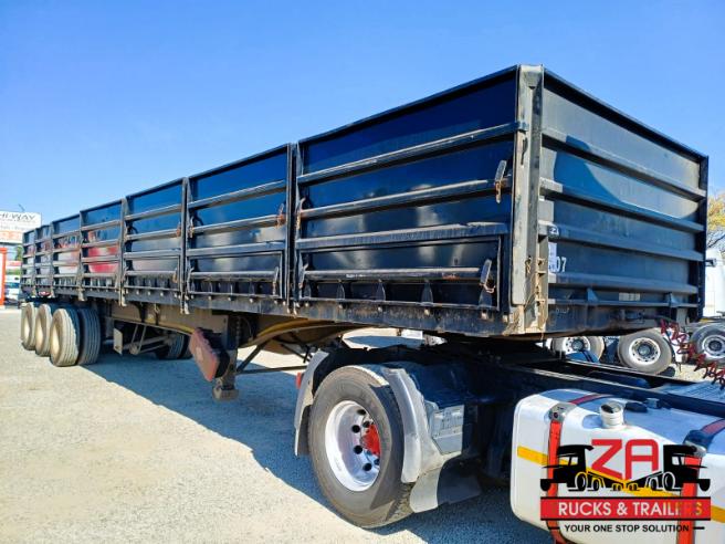 2023 HENRED FRUEHAUF TRI-AXLE DROPSIDE TRAILER