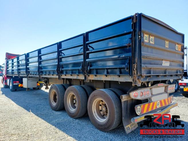 2023 HENRED FRUEHAUF TRI-AXLE DROPSIDE TRAILER