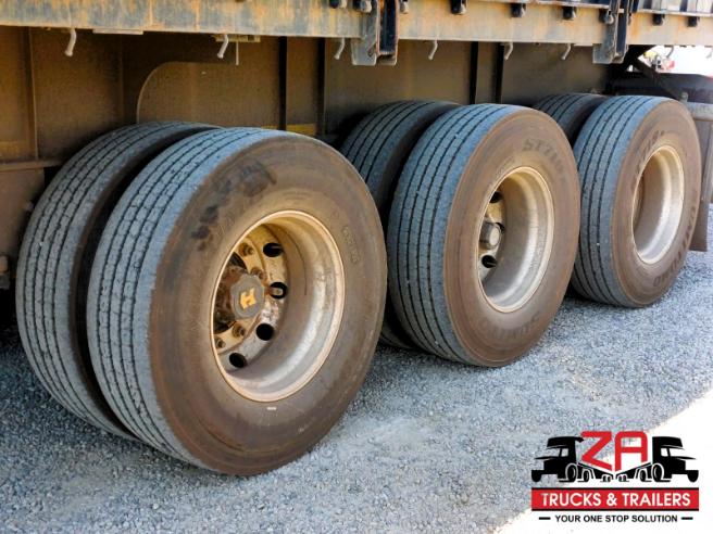 2023 HENRED FRUEHAUF TRI-AXLE DROPSIDE TRAILER
