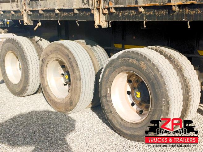 2023 HENRED FRUEHAUF TRI-AXLE DROPSIDE
