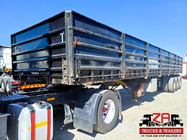 2023 HENRED FRUEHAUF TRI-AXLE DROPSIDE