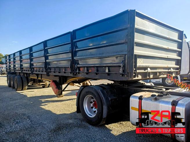 2023 HENRED FRUEHAUF TRI-AXLE DROPSIDE