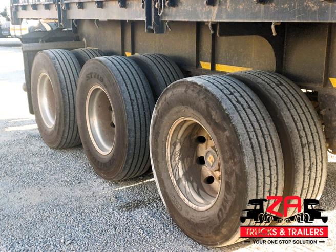 2023 HENRED FRUEHAUF TRI-AXLE DROPSIDE