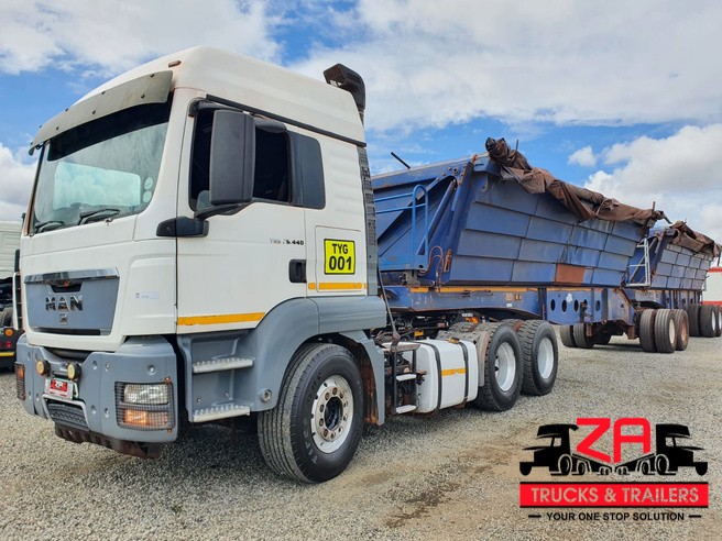 2008 AFRIT 40 CUBE SIDE TIPPER & 2014 MAN TGS26.440