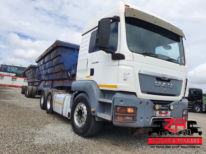 2008 AFRIT 40 CUBE SIDE TIPPER & 2014 MAN TGS26.440