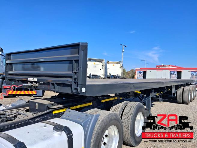 2021 HENRED FRUEHAUF TRI-AXLE FLAT DECK TRAILER