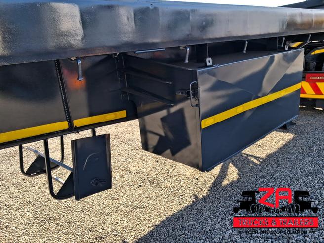2021 HENRED FRUEHAUF TRI-AXLE FLAT DECK TRAILER