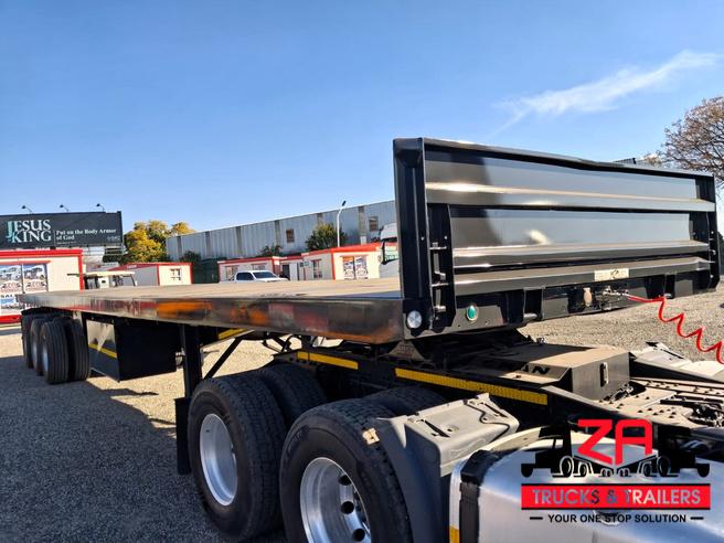 2021 HENRED FRUEHAUF TRI-AXLE FLAT DECK TRAILER